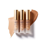 Three pump bottles of Biologique Recherche Eye Care Concealer in shades of beige and brown, displayed with a swatch of the concealer product.
