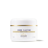 A white jar with a gold band labeled 'CREME ELASTINE' from Biologique Recherche.